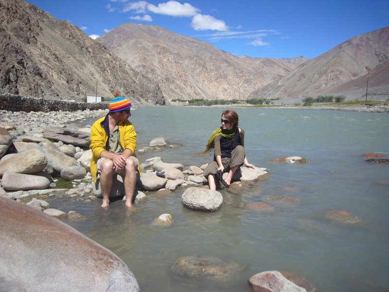 The hot sulphurous water blended with the freezing river.